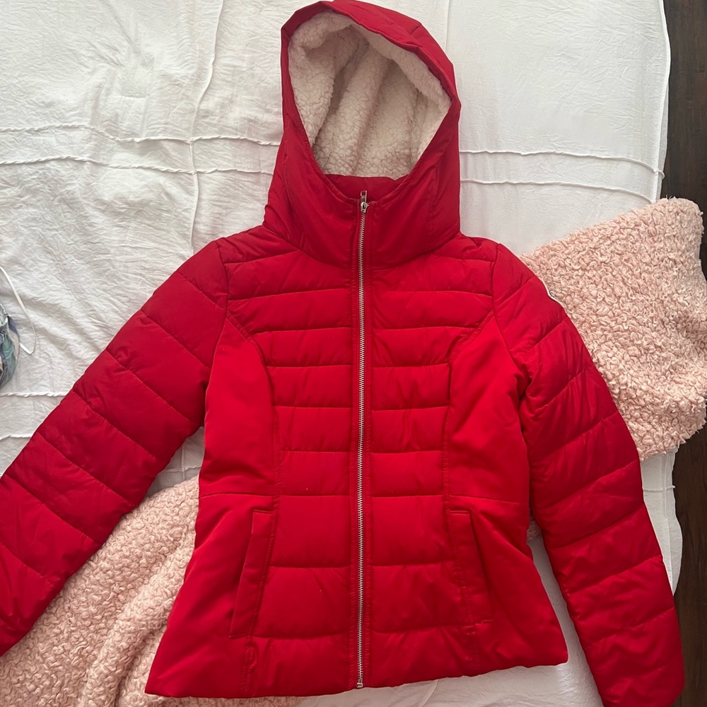 Red puffer jacket